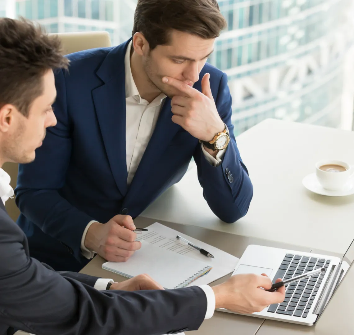 business consultants reviewing financial documents