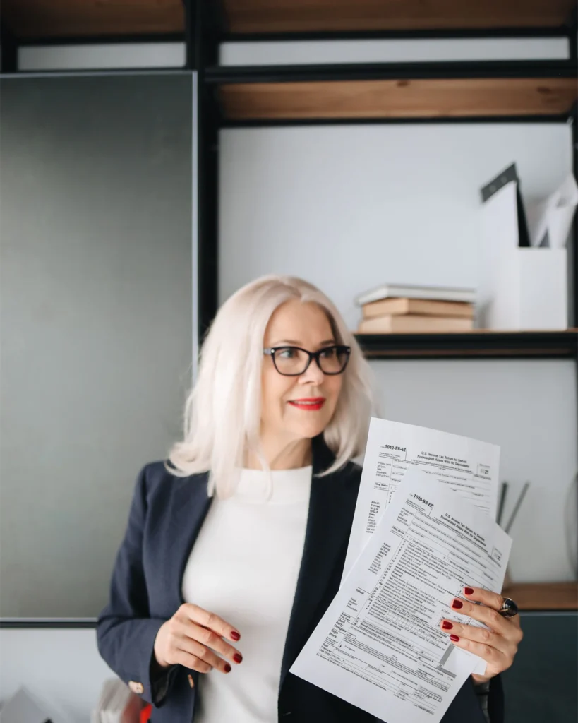 Adviser reviewing an employment document in a bright office