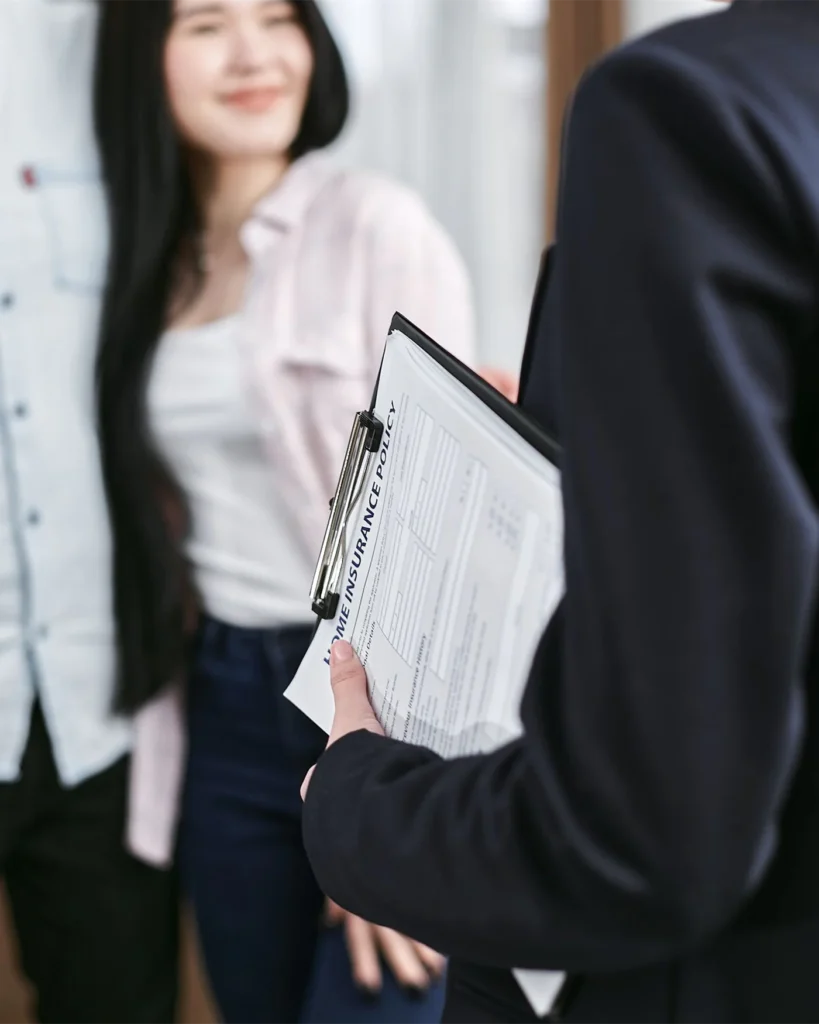 Professional holding a claim form during a business meeting
