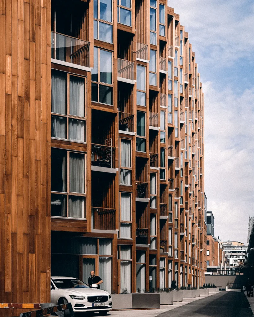 A modern Swedish apartment building with a timber facade