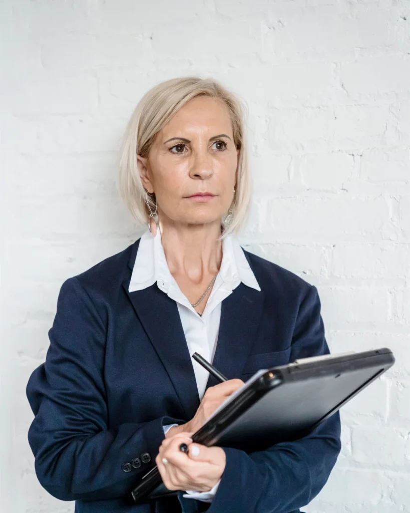 An adviser reviewing a residence permit case file