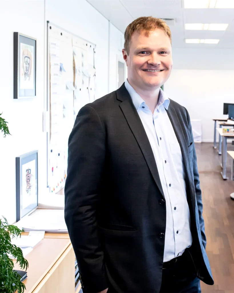 A commercial lease lawyer in a bright modern office