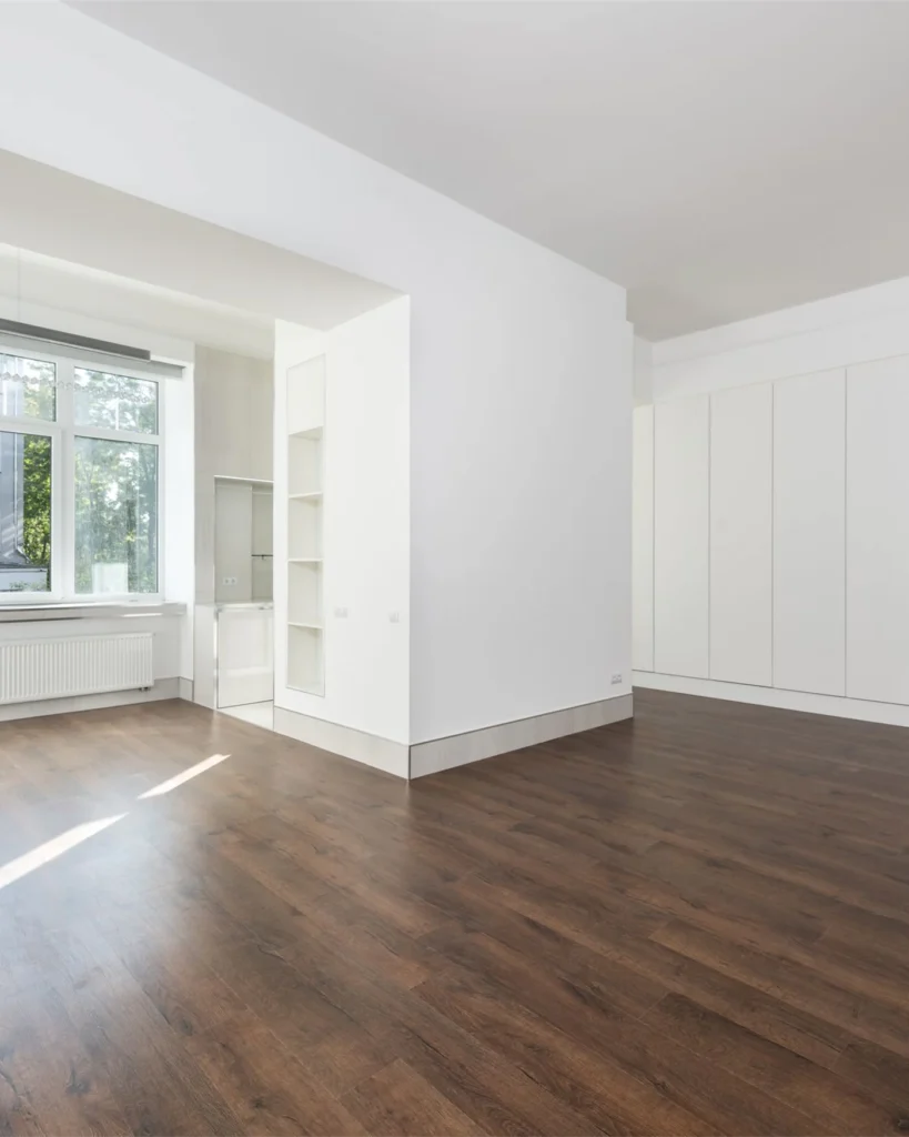 A restored commercial unit with bare floors before handover
