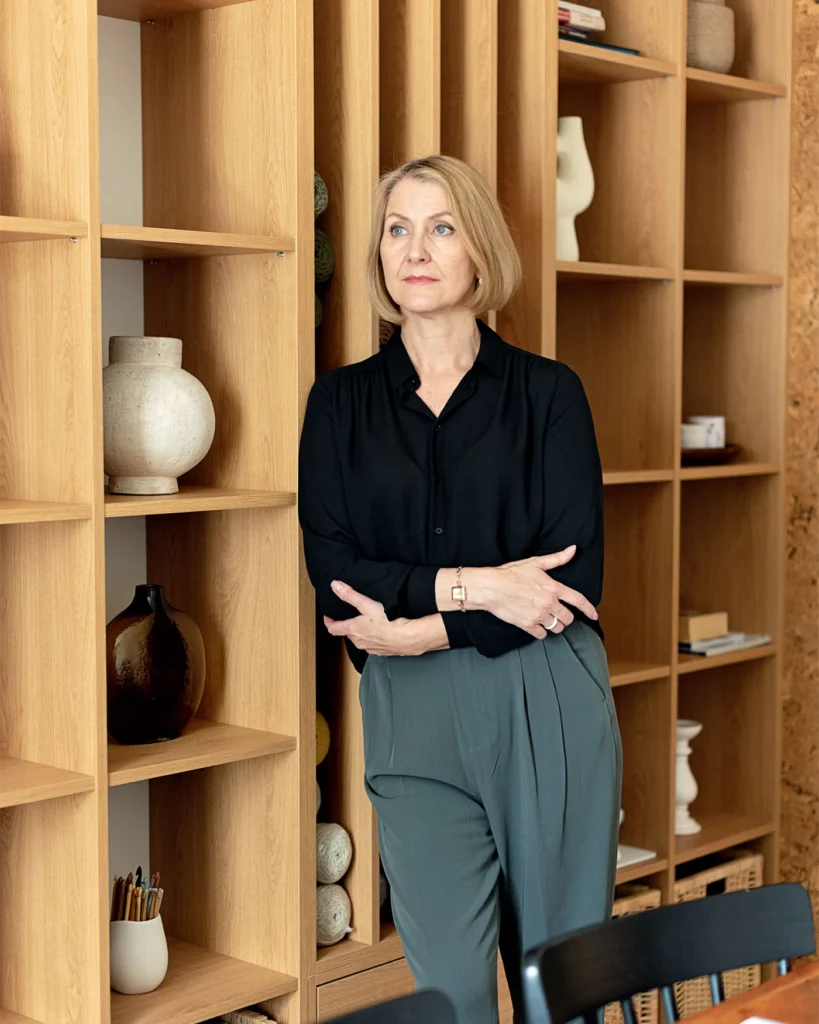 A lawyer standing in a bright modern office